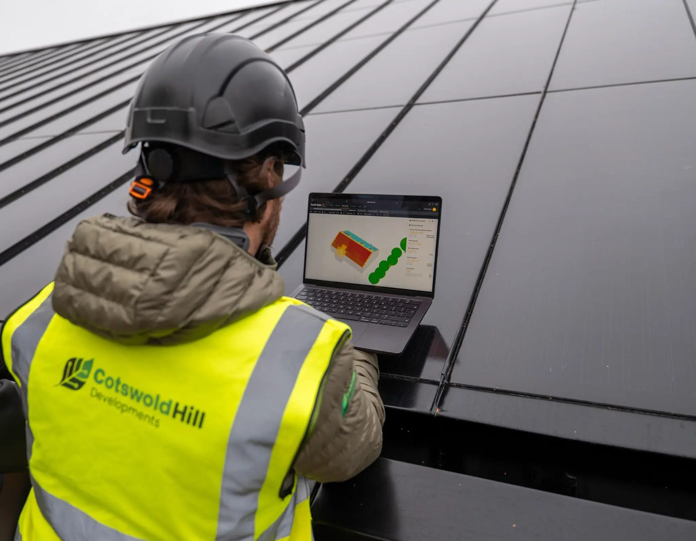 3D solar design model on laptop on roof